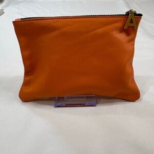 Jesse & Co. Orange Leather Cosmetic Pouch with Brass Zip closure